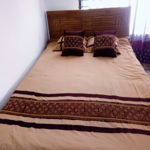 Beautiful handsewn cross stitched vorat worked double bed sized bedsheet